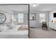 Spacious main bedroom featuring a four-poster bed, and dresser at 6352 Perry Creek Rd, Raleigh, NC 27616