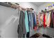 Well-organized walk-in closet with shelves, hanging rods, and ample storage space at 6352 Perry Creek Rd, Raleigh, NC 27616