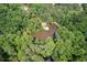 Aerial view of a pond surrounded by trees with an amphitheater at 6412 Heartwood Dr, Chapel Hill, NC 27516
