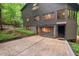 View of the exterior showing a parking area and entrance to the home at 6412 Heartwood Dr, Chapel Hill, NC 27516