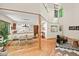 Spacious living area with a dining table, an open kitchen, and inviting decor at 6412 Heartwood Dr, Chapel Hill, NC 27516