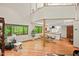 Inviting living area showcasing an open layout, natural light, and seamless connection to the dining and kitchen spaces at 6412 Heartwood Dr, Chapel Hill, NC 27516