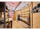 Unfinished storage area with ample shelving, exposed wood, and sturdy construction at 6412 Heartwood Dr, Chapel Hill, NC 27516