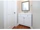 Bathroom featuring modern vanity, mirror, and fixtures at 6756 Olde Province Ct, Raleigh, NC 27609