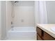 Standard bathroom with a shower and tub combination, along with a ceramic tile backsplash at 6756 Olde Province Ct, Raleigh, NC 27609
