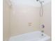 Standard bathroom features a white tiled bathtub with a shower head at 6756 Olde Province Ct, Raleigh, NC 27609