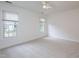 Bedroom with two windows and a ceiling fan at 6756 Olde Province Ct, Raleigh, NC 27609