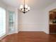 Bright dining room featuring hardwood flooring at 6756 Olde Province Ct, Raleigh, NC 27609