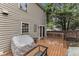 Inviting backyard deck area, ideal for outdoor dining and relaxation with easy access to the home's interior at 6828 Edwell Ct, Raleigh, NC 27617