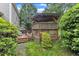 Charming backyard deck with a wooden gazebo, perfect for outdoor entertaining and relaxation at 6828 Edwell Ct, Raleigh, NC 27617