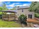 Beautiful home with a spacious deck and gazebo, perfect for enjoying outdoor living in a serene backyard setting at 6828 Edwell Ct, Raleigh, NC 27617
