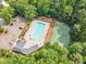 Aerial view of the community pool and tennis courts, offering residents a variety of recreational amenities at 6828 Edwell Ct, Raleigh, NC 27617