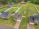 Wide aerial shot features the home, fenced yard with a pool, shed, and large neighboring lots at 71 Sandy Farm Ct, Willow Springs, NC 27592