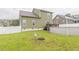 Large backyard features an above-ground pool, a small wooden deck, and white vinyl fence at 71 Sandy Farm Ct, Willow Springs, NC 27592