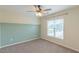 Comfortable bedroom with a neutral color scheme and a large window providing natural light at 71 Sandy Farm Ct, Willow Springs, NC 27592