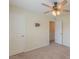 Simple bedroom with carpet flooring, ceiling fan, and entry doorway at 71 Sandy Farm Ct, Willow Springs, NC 27592