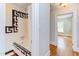 Bathroom featuring bathtub, tiled walls, and hardwood floors at 800 E Forest Hills Blvd, Durham, NC 27707