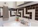 Bathroom sink featuring modern faucet and checkered tile design at 800 E Forest Hills Blvd, Durham, NC 27707