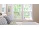 Comfortable bedroom featuring large windows that provide lots of natural light at 800 E Forest Hills Blvd, Durham, NC 27707