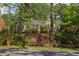 Charming cottage-style home with inviting curb appeal and a well-maintained front yard at 800 E Forest Hills Blvd, Durham, NC 27707