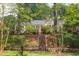 Quaint cottage-style home with inviting curb appeal and a well-maintained front yard at 800 E Forest Hills Blvd, Durham, NC 27707