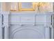 Detail of a white fireplace with decorative mantle and built-in shelving, creating a cozy and inviting space at 800 E Forest Hills Blvd, Durham, NC 27707