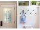 Charming mudroom features decorative accents, bench seating and storage at 800 E Forest Hills Blvd, Durham, NC 27707