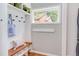 Bright mudroom with a cozy bench, storage, and natural light at 800 E Forest Hills Blvd, Durham, NC 27707
