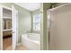 Bathroom featuring a soaking tub, shower, and tile flooring at 825 Federal House Ave, Wake Forest, NC 27587
