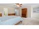 Spacious bedroom featuring carpet, ceiling fan, and natural light at 825 Federal House Ave, Wake Forest, NC 27587
