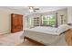 Bedroom with a ceiling fan and a large window allowing natural light at 825 Federal House Ave, Wake Forest, NC 27587