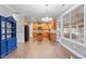 Spacious kitchen with wood cabinets, granite countertops, and an island, open to the main living spaces at 825 Federal House Ave, Wake Forest, NC 27587
