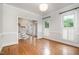 Bright living room showcasing hardwood floors and neutral wall color at 8420 Caldbeck Dr, Raleigh, NC 27615