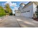 Exterior view showcases a home with a multi-car garage and ample parking space at 8709 Kimalden Ct, Wake Forest, NC 27587