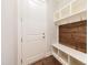 Mud room with cubbies, a bench and coat hooks at 8709 Kimalden Ct, Wake Forest, NC 27587