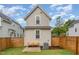 This home boasts a well-maintained backyard with wood fence, perfect for outdoor activities at 902 B Oakland Ave, Durham, NC 27705