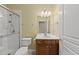 Clean and functional bathroom featuring a walk-in shower and vanity sink at 923 Peltier Dr, Cary, NC 27519