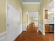 Welcoming home foyer with hardwood floors, white trim, and an open view into the living spaces at 923 Peltier Dr, Cary, NC 27519
