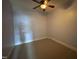 Bedroom features carpeted floor, painted walls, and ceiling fan at 929 Sagamore Dr, Louisburg, NC 27549