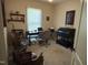Functional home office setup with desk, shelves, and comfortable seating at 929 Sagamore Dr, Louisburg, NC 27549