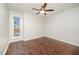 Unfurnished bedroom with a ceiling fan features a window that brightens the space at 100 Longneedle Ct, Raleigh, NC 27603