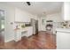 Updated kitchen featuring white cabinets, stainless steel appliances, and modern countertops at 100 Longneedle Ct, Raleigh, NC 27603