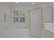 Bathroom with a soaking tub, a gold-trimmed shower enclosure and natural light at 1003 Gloucester Ct, Chapel Hill, NC 27516