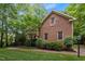 Beautiful brick home with well-maintained landscaping and traditional architecture at 1003 Gloucester Ct, Chapel Hill, NC 27516