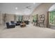 Open concept living area with comfortable seating, natural light, and neutral decor at 1003 Gloucester Ct, Chapel Hill, NC 27516