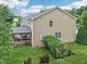 The backyard has a well maintained lawn and a deck for outdoor entertaining at 1008 Wolfs Bane Dr, Apex, NC 27539