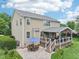 An aerial view of the backyard shows a spacious layout with a deck and a patio at 1008 Wolfs Bane Dr, Apex, NC 27539