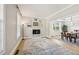 Bright and airy living room with hardwood floors and decorative wall art at 1008 Wolfs Bane Dr, Apex, NC 27539