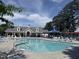 Enjoy the community pool with plenty of seating and a covered pergola at 1008 Wolfs Bane Dr, Apex, NC 27539