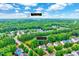 Aerial view of the property's location, showcasing its proximity to Holly Springs, lush greenery, and neighborhood at 101 Ironcreek Pl, Apex, NC 27539